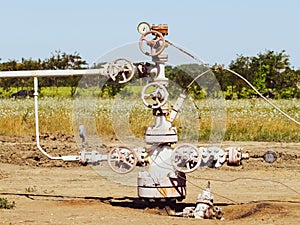 Well for oil and gas production. Oil well wellhead . Oil production