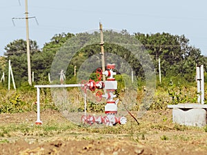 Well for oil and gas production. Oil well wellhead . Oil production