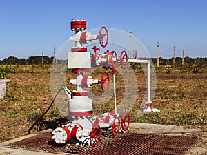 Well for oil and gas production. Oil well wellhead . Oil production