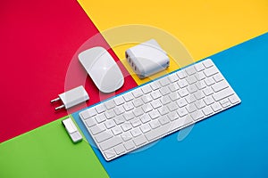 Well organised white office objects on colorful background