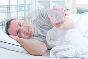 Well-rested man in bed