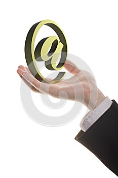 Well shaped businessman hand holding email symbol