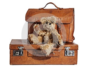 Well-Traveled Vintage Suitcase and Teddy Bear