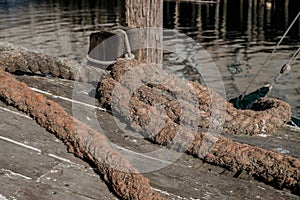 Well used industrial hawser rope used to tie down large lobster photo