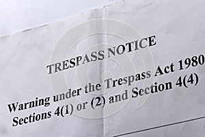 A well-worn trespass notice photo