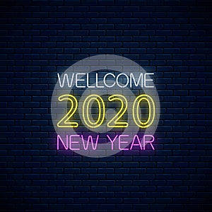 Wellcome 2020 new year glowing neon text. 2020 new year seasonal greeting cards or invitation design, banner. Neon style photo