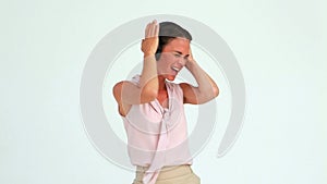 Welldressed woman dancing with headphones