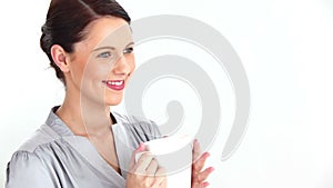 Welldressed woman drinking coffee