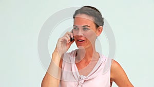 Welldressed woman on the phone