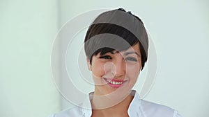 Welldressed woman smiling