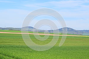 Welling, Germany - 05 09 2021: green spring landscape in the Eifel with twin volcanos