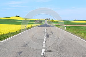 Welling, Germany - 05 09 2021: straight road through the Eifel in spring photo