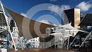 Wellington, Aotearoa / New Zealand. Cityscape of downtown CBD open area covered by a shade sail