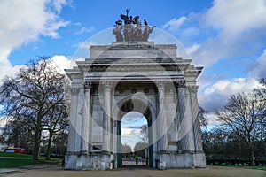 Wellington Arch or Constitution Arch is a triumphal arch located to the south of Hyde Park in London. Dramatic cloudy