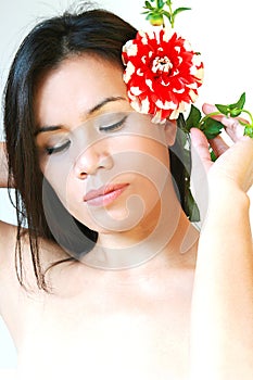 Wellness girl with red flower