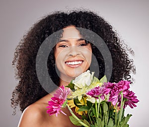 Wellness portrait or face of black woman or flowers in studio for health, luxury spa or self care. Aesthetic, beauty