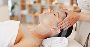 Wellness, spa and woman getting facial massage in beauty salon to relax. Calm, peace and luxury treatment for skin