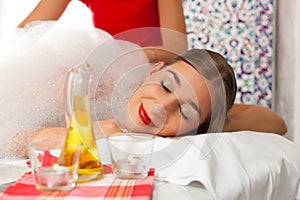 Wellness - woman getting massage in Spa