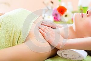 Wellness - woman getting shoulder massage in Spa