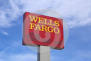 Wells Fargo sign on blue sky photo
