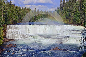 Wells Gray Provincial Park with Rainbow over Dawson Falls on Myrtle River, Cariboo Mountains, British Columbia, Canada