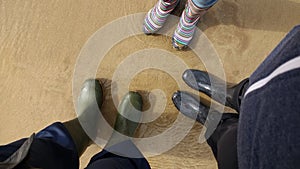 Welly boots on sand