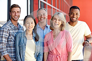 Were all in it together. Portrait of a diverse group of coworkers in a casual office environment.