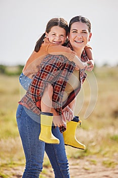 Were always down for some outdoor fun. a woman and her daughter spending time outside on their farm.