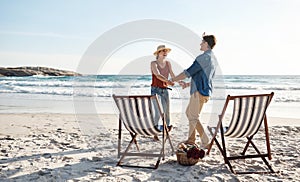 Were exactly where were supposed to be. a middle aged couple dancing on the beach.