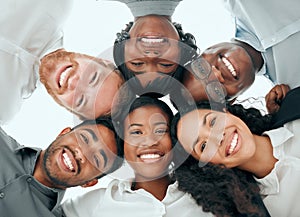 Were a force when we work together. Low angle portrait of a diverse group of young businesspeople standing in a huddle