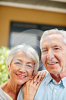 Were just two lovebirds enjoying our retirement together. Portrait of a happy senior couple outdoors.