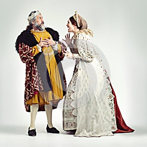 Were you always this shrill mlady. Studio shot of a king and queen arguing.