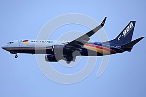 West Atlantic plane flying, blue sky with clouds