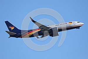 West Atlantic plane flying, blue sky with clouds