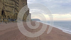 West Bay Sandstone Cliffs Overlooking the Sea in England