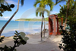 West Indies, Caribbean, Antigua, St Georges, Dickenson Bay, Beach & Red Telephone Box photo