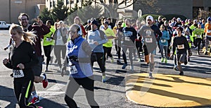 People running at al local turkey trot race