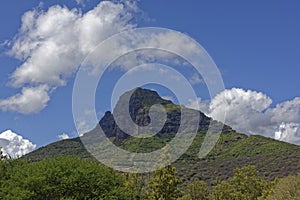 The West Peak of Trois Mamelles Mountain near to the Black river Gorge on the Tropical Island of Mauritius.