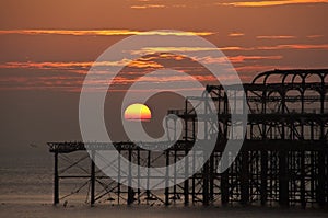 The West Pier in Brighton at sunset