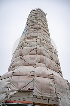 Westerhever Lighthouse construction site north sea, low angle view, germany, vertical shot