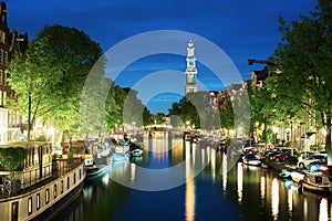 Westerkerk church tower at canal