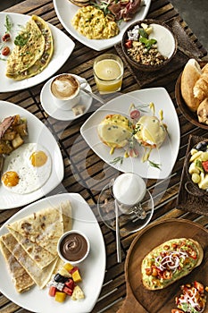 Western big gourmet breakfast selection mixed dishes on restaurant table