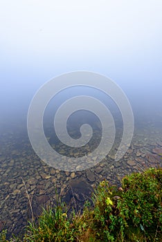 Misty morning view in wet mountain area in slovakian tatra