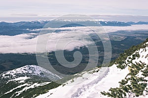 Mountain tops in winter covered in snow - vintage film look