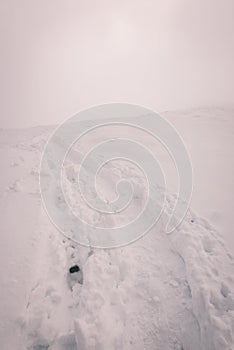 Mountain tops in winter covered in snow - vintage film look