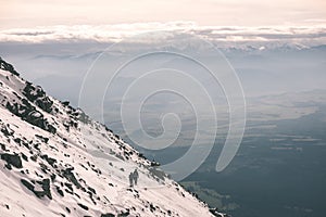 Mountain tops in winter covered in snow - vintage film look