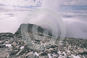 Mountain tops in winter covered in snow - vintage retro look