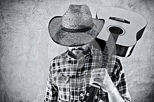 Western country cowboy musician with guitar