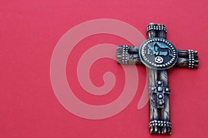 Cross on a red background photo