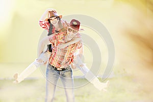 Western happy couple laughing and fooling around photo